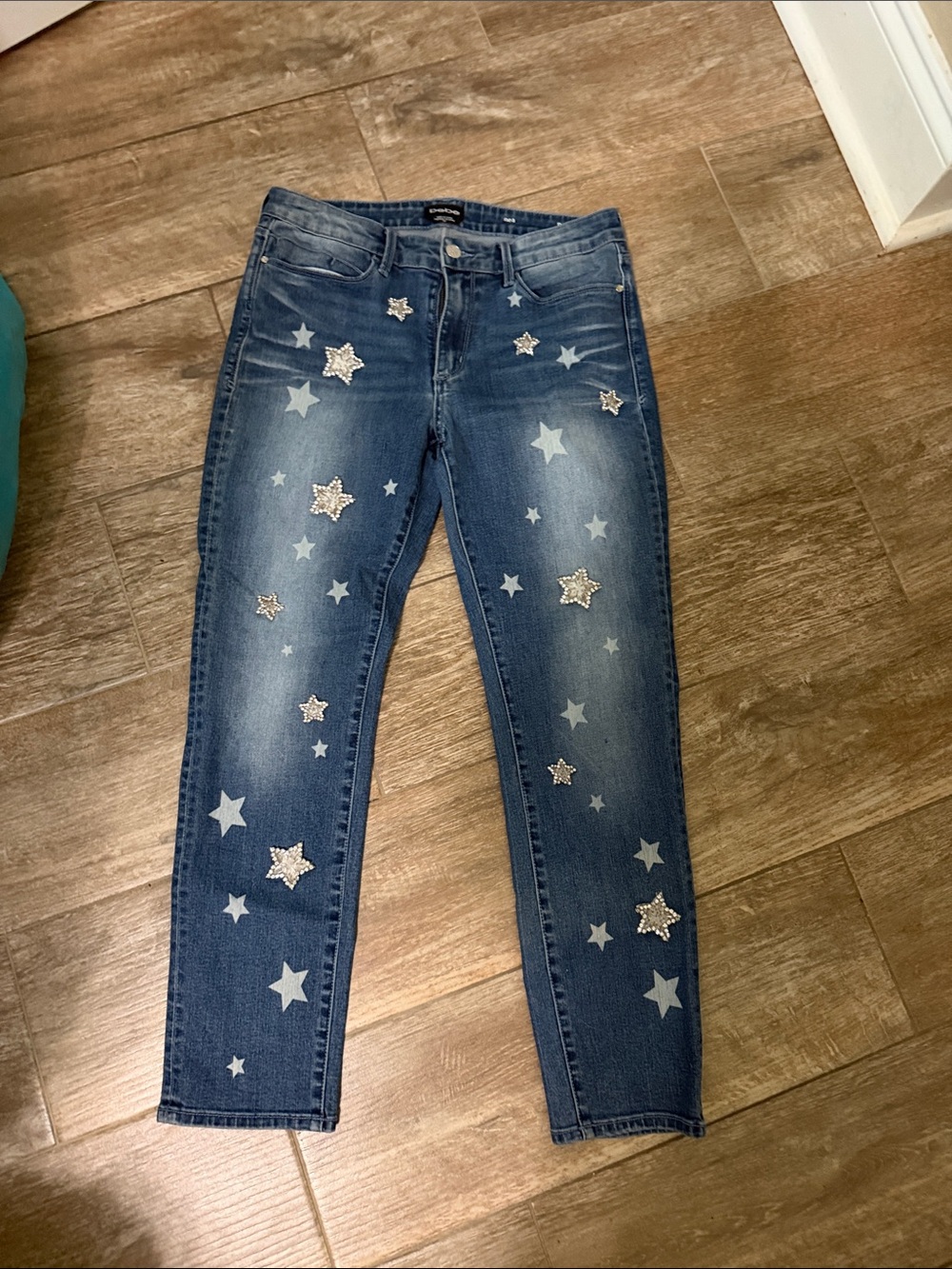 bebe Blue Skinny Jeans with Silver Star Appliqués